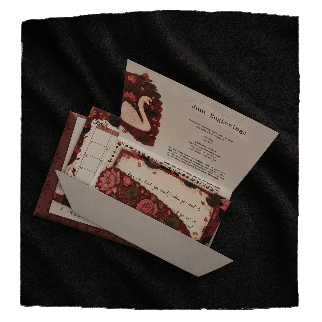 Poetry In Pieces product on dark fabric. Opened envelope with monthly edition.